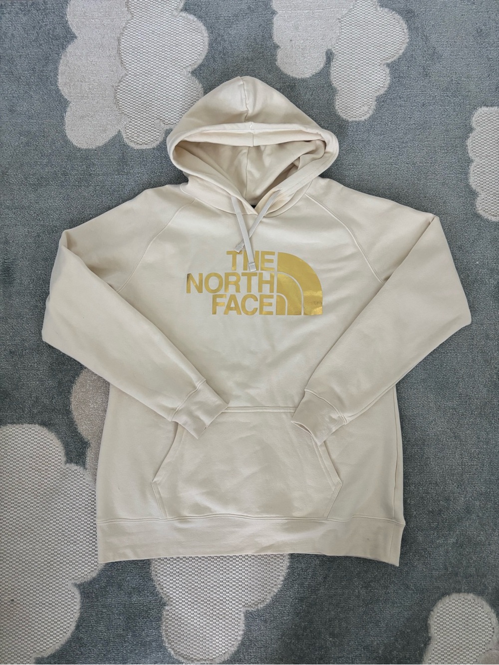 The North Face Cream Pullover Hoodie with Gold Logo